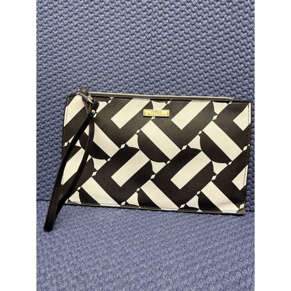 Trina by Trina Turk black and white cosmetic bag with geometric pattern